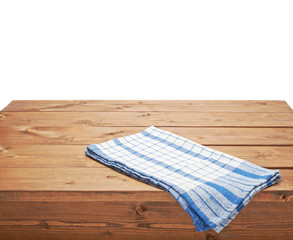 Wall Mural - Tablecloth or towel over the wooden table