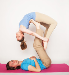 Young couple in yoga pose