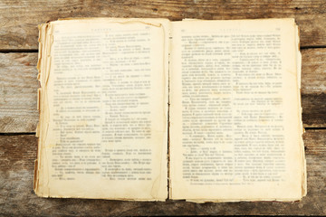 Wall Mural - Old book on wooden table