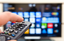 Smart Tv And Hand Pressing Remote Control