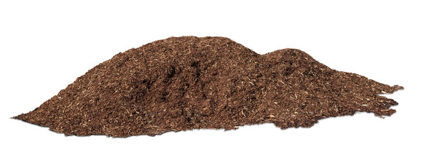 A pile of organic tree bark mulch