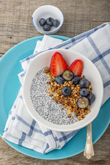 Wall Mural - Granola with chia seeds, blueberries, strawberries