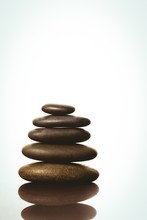 Zen Stones Balancing On White Background