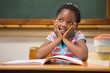 © WavebreakMediaMicro - Pupil sitting at her desk