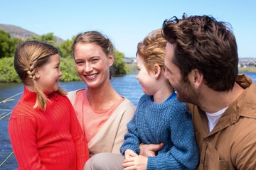 Wall Mural - Happy family at a lake