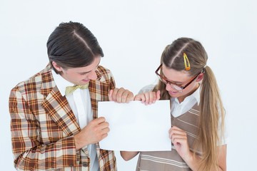 Poster - Geeky hipsters holding a poster