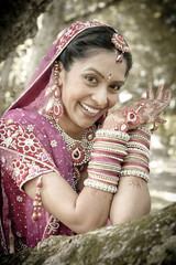 Wall Mural - happy beautiful hindu Indian bride outdoors smiling having fun