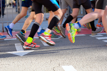 Wall Mural - Marathon running race, people feet on road, sport concept