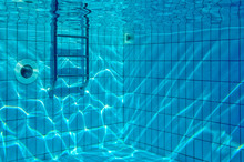 Sun Reflections In Pool