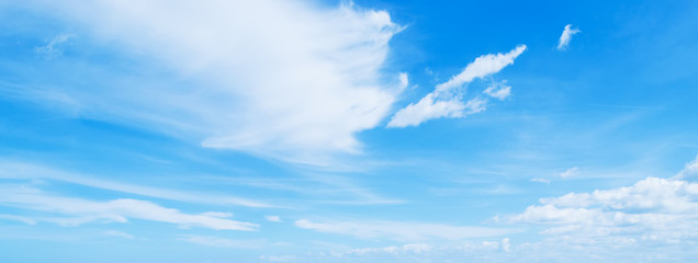 white soft clouds and blue sky