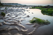 Low tide at British beach after sunset, England, UK