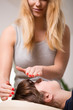 © Photographee.eu - Bioenergy therapist doing reiki therapy