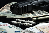Fototapeta  - Illegal drugs , money and guns