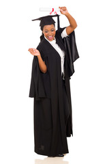 Wall Mural - female african american graduate celebrating