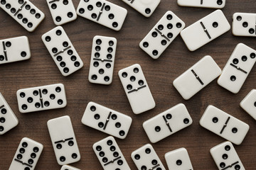Wall Mural - domino pieces on the wooden table background