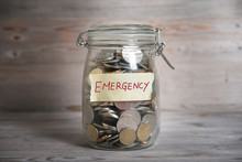 Money Jar With Emergency Label.