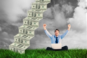 Poster - Businessman cheering with laptop sitting on floor
