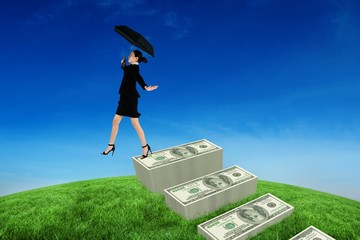 Aufkleber - Composite image of young businesswoman holding umbrella