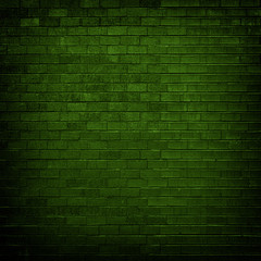 Wall Mural - Green brick wall with dim light for background