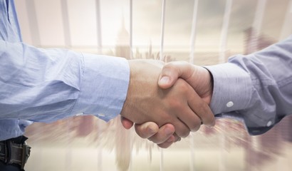 Wall Mural - Composite image of two men shaking hands