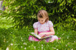 © p_r_g - girl is  reading on the grass