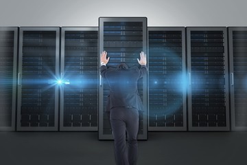 Poster - Composite image of businessman standing and pushing with hands