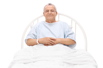 Sticker - Cheerful mature patient lying in a hospital bed