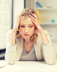 Sticker - unhappy woman in office