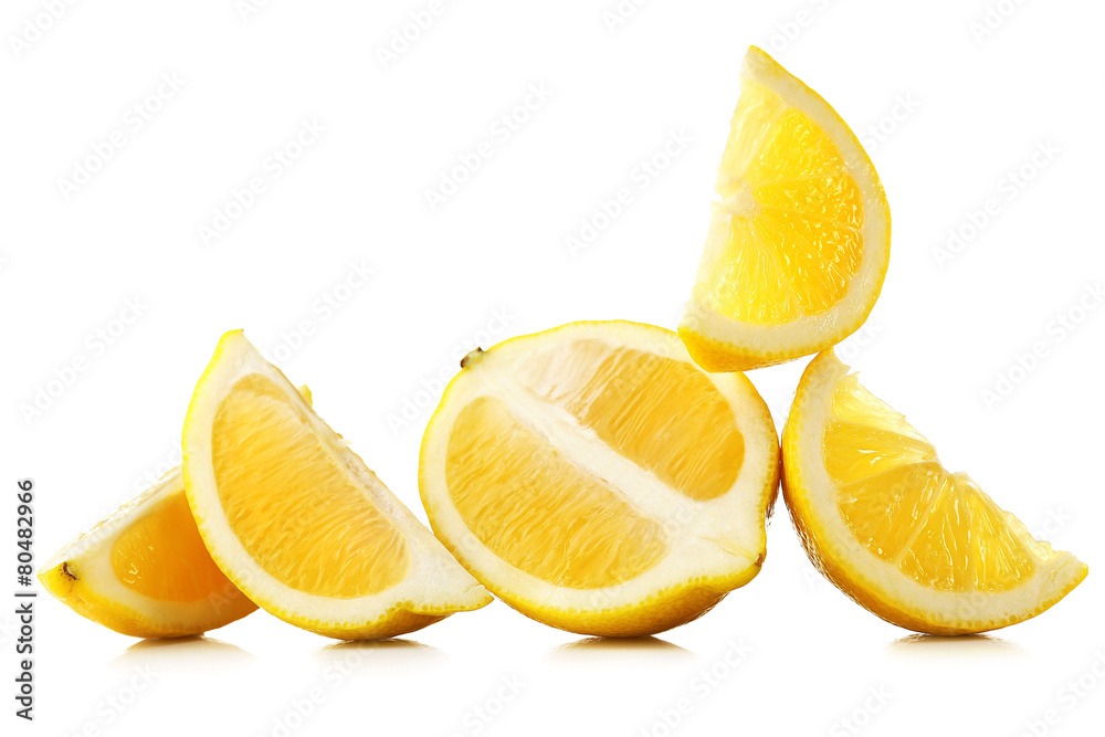Juicy slices of lemon isolated on white