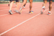© SKT Studio - Running track with blur of runner feet in stadium