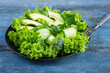 fresh green salad with avocado, cucumber and broccoli