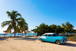Old classic car on the beach of Cuba