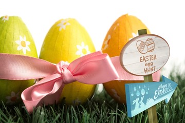 Wall Mural - Composite image of easter egg hunt sign