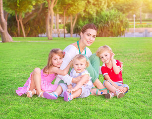 Wall Mural - Happy mother with babies