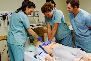 Medical staff practicing CPR