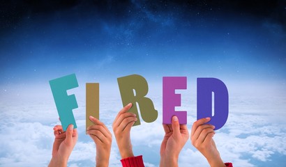 Poster - Composite image of hands holding up fired