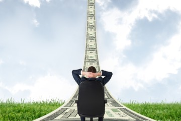 Poster - Composite image of businessman sitting in swivel chair