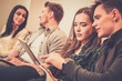 © Nejron Photo - Group of students preparing for exams in apartment interior