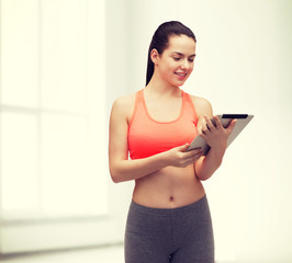 Canvas Print - sporty woman with tablet pc computer