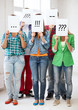 © Syda Productions - friends or students covering faces with papers