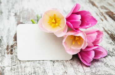 Canvas Print - tulips with a card