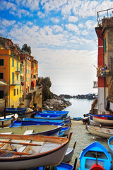 Wall Mural - Riomaggiore village street, boats and sea. Cinque Terre, Ligury,