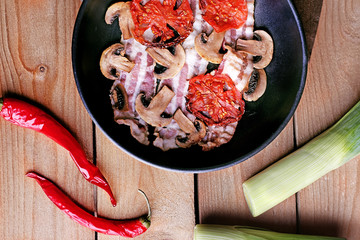 Sticker - Strips of bacon with sliced mushrooms and tomato in pan