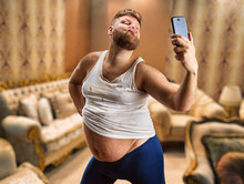Fat Glamour Man Takes Selfie