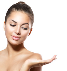 Wall Mural - spa girl showing empty copy space on the open hand palm