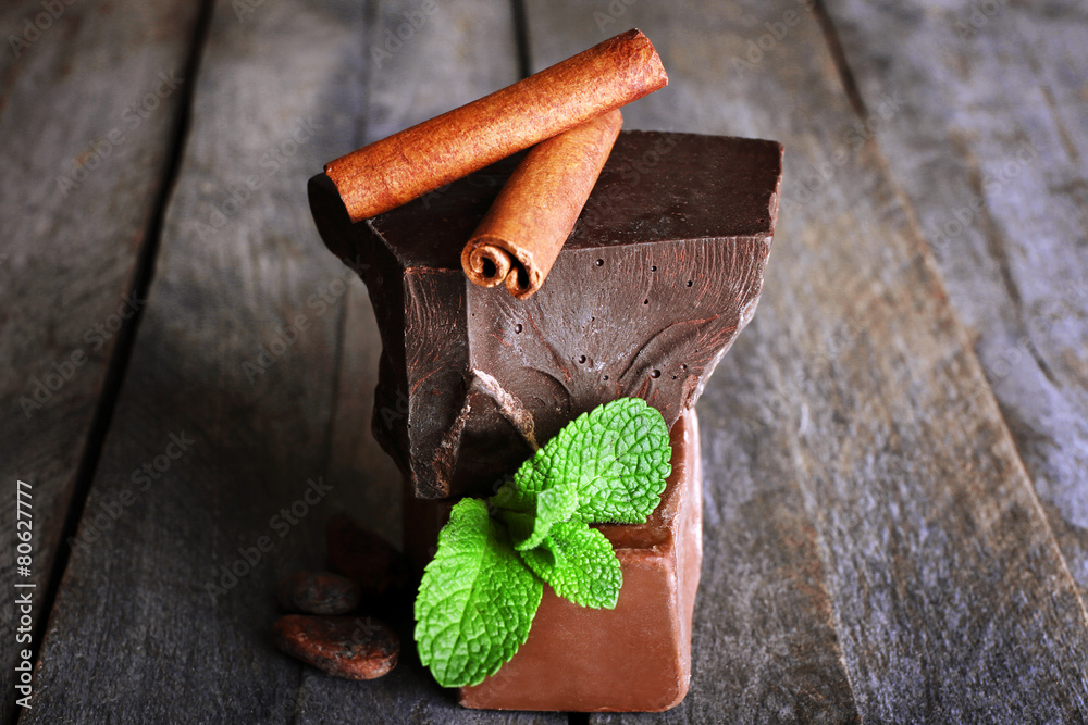 Still life with set of chocolate on wooden background