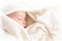 Baby Sleeping Covered With Soft Blanket