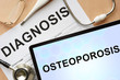 Tablet with diagnosis osteoporosis  and stethoscope.