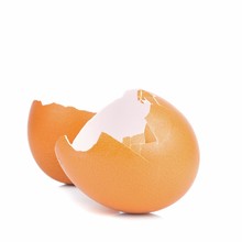 An Empty Broken Brown Egg Shell On A White Background