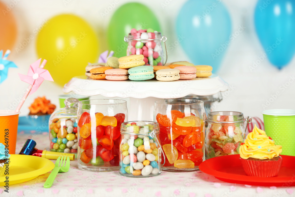 Prepared birthday table with sweets for children party